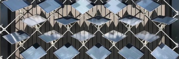 Movable solar panels on facade