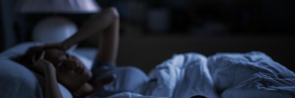 A women with sleep insomnia in bed