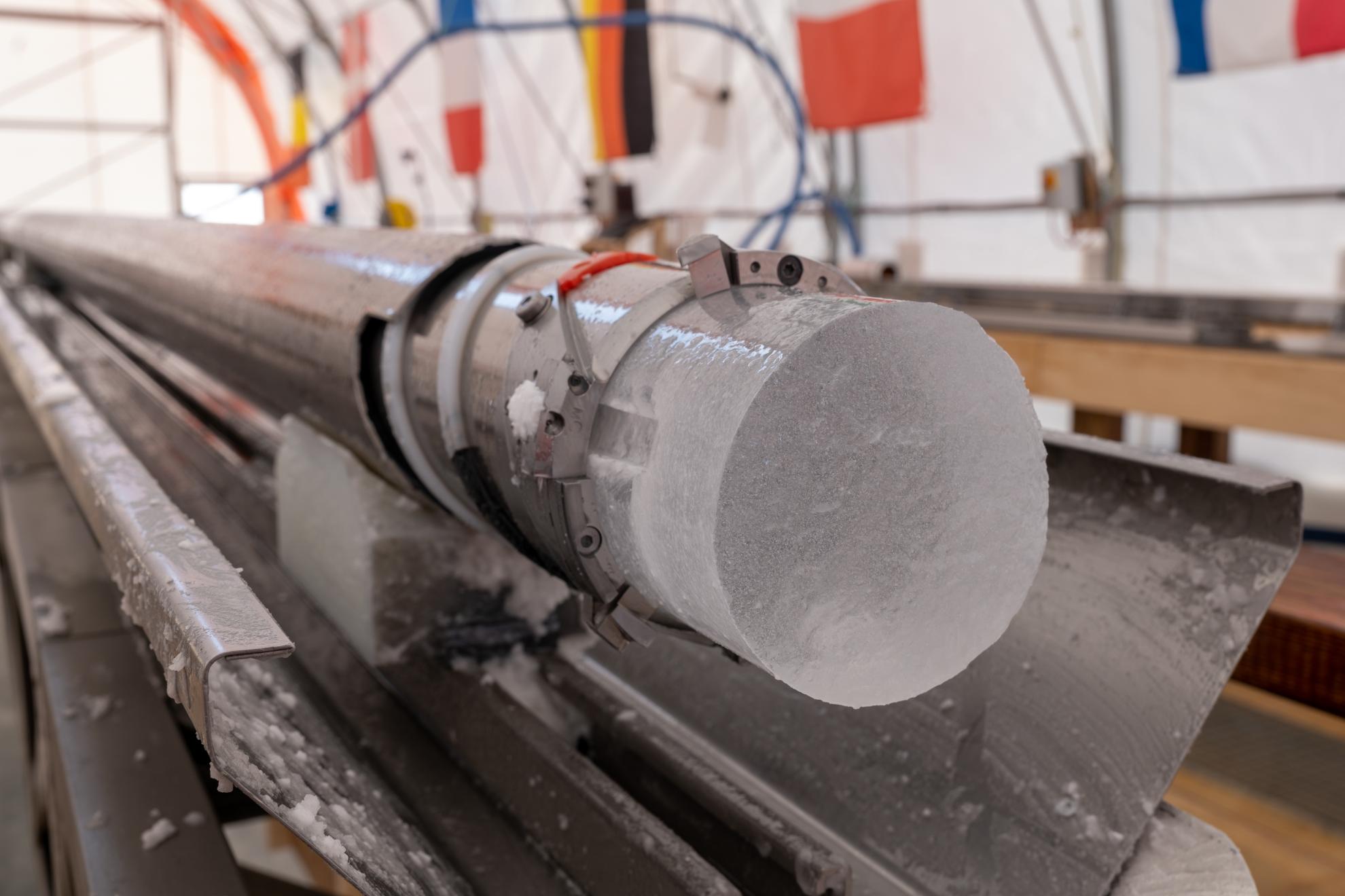 A freshly drilled ice core is measured.